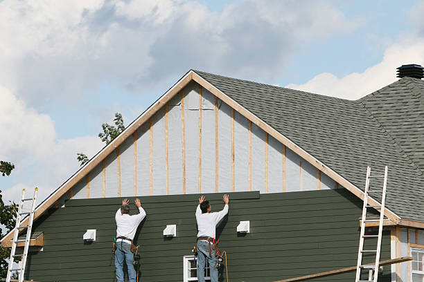 Professional Siding Installation technician working in Cortez, FL